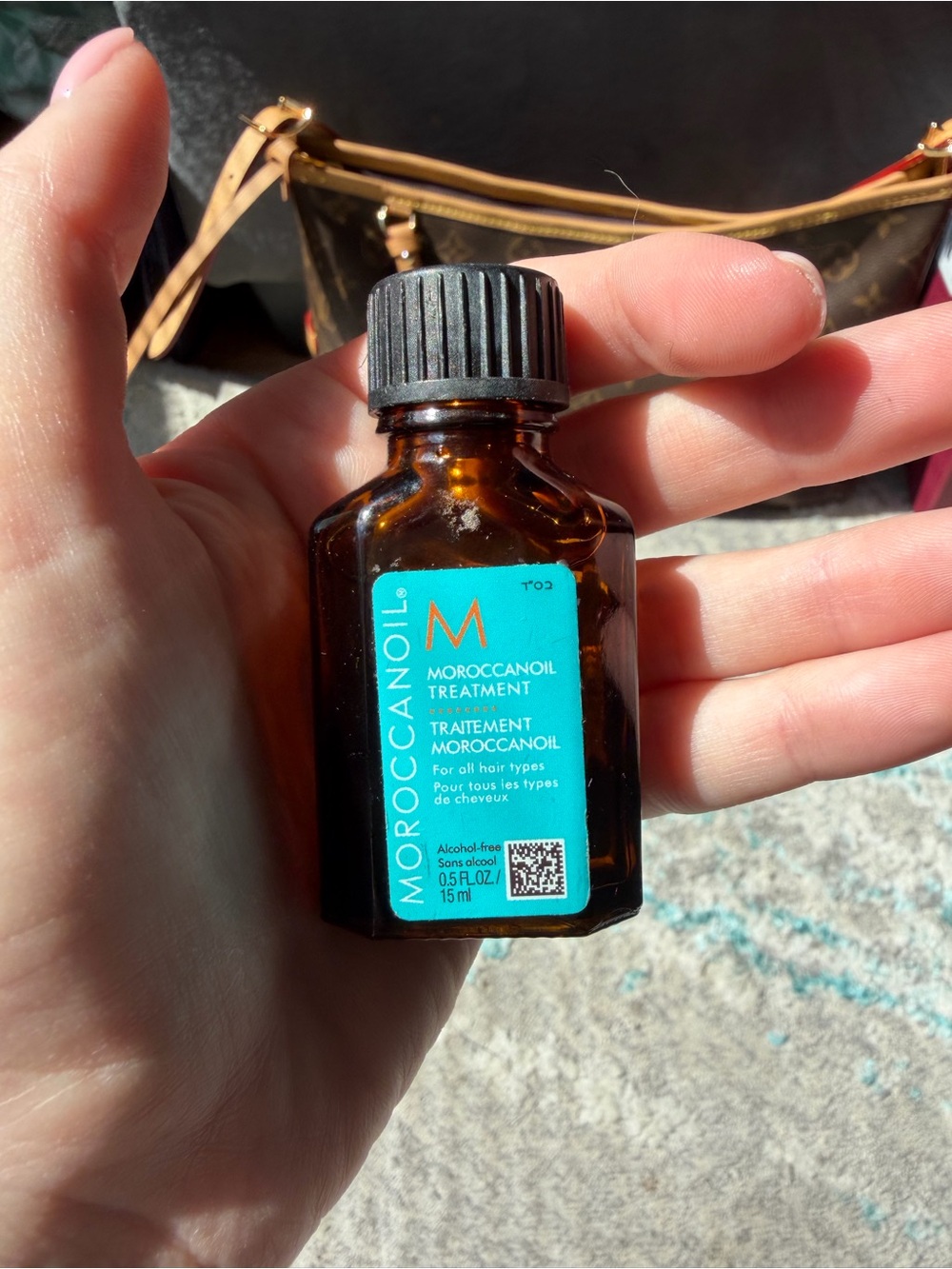Moroccanoil Treatment Serum with Bright Turquoise Label
